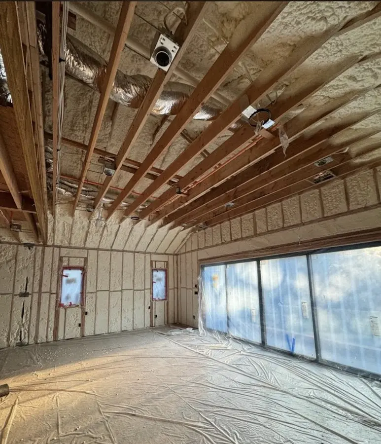 Interior walls and ceiling insulated with spray foam during new construction in Montville